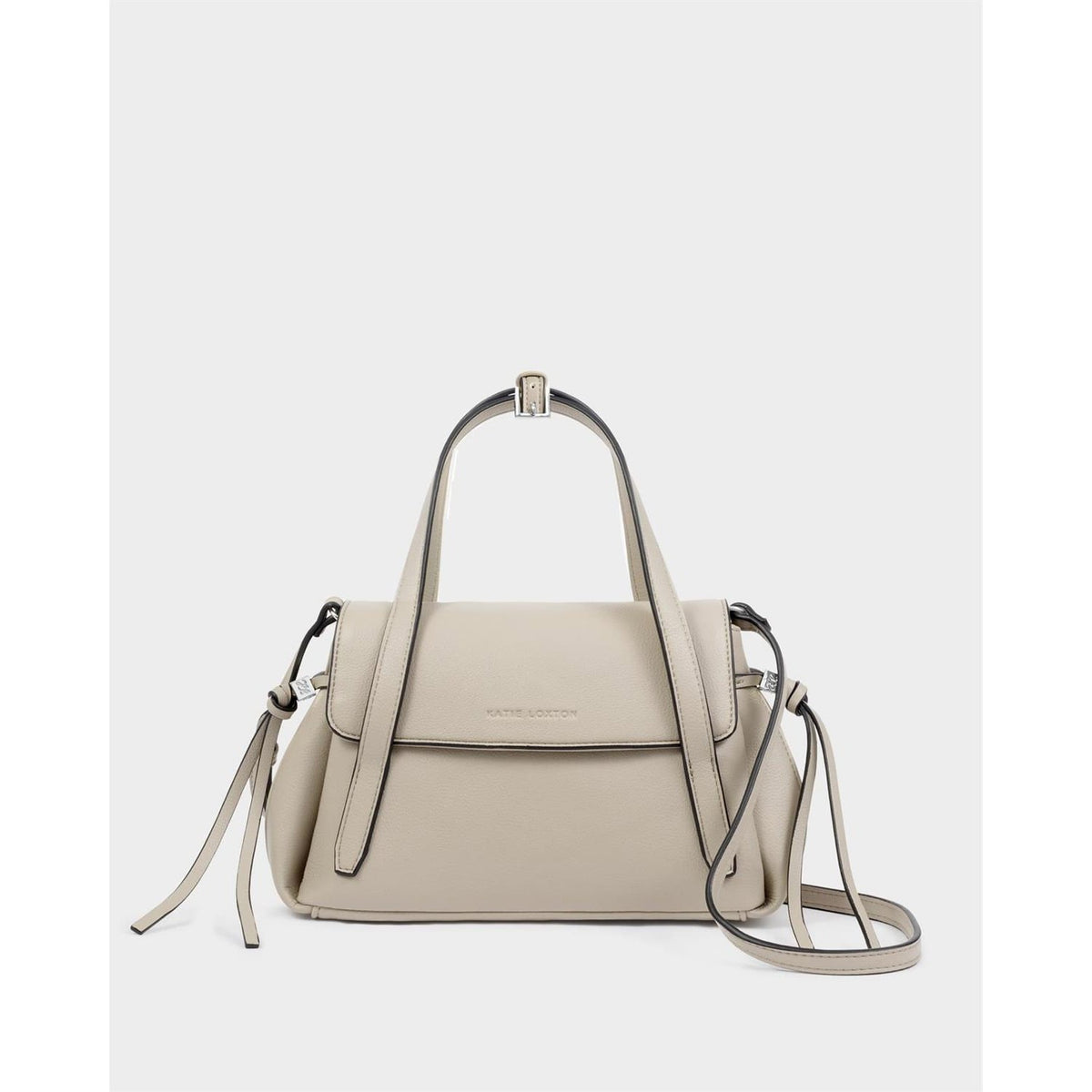 Alyssa taupe handbag, front view with top handles, a front flap, side tassels and a long shoulder strap.